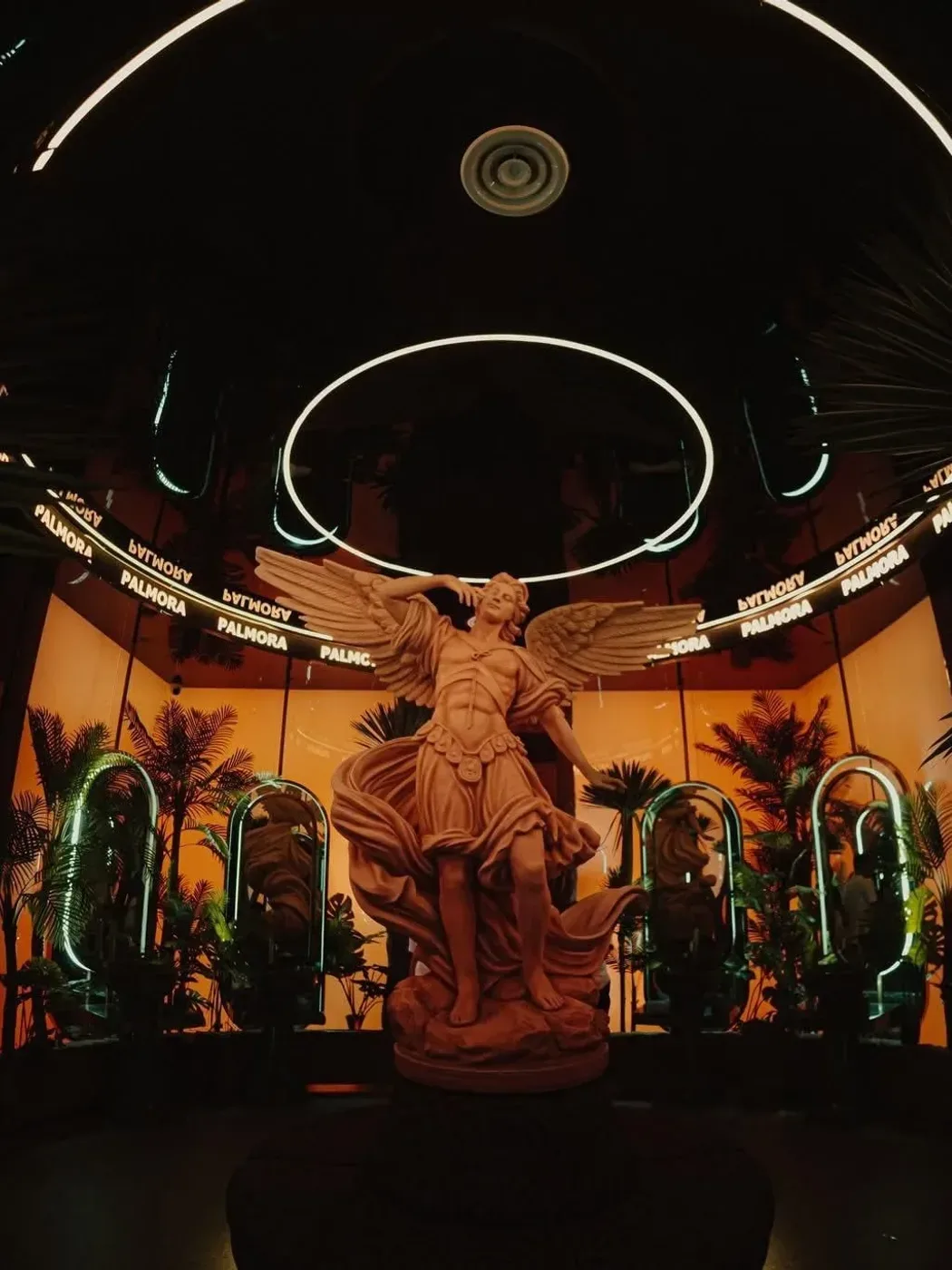 Art statue in Palmora Saigon's tropical space