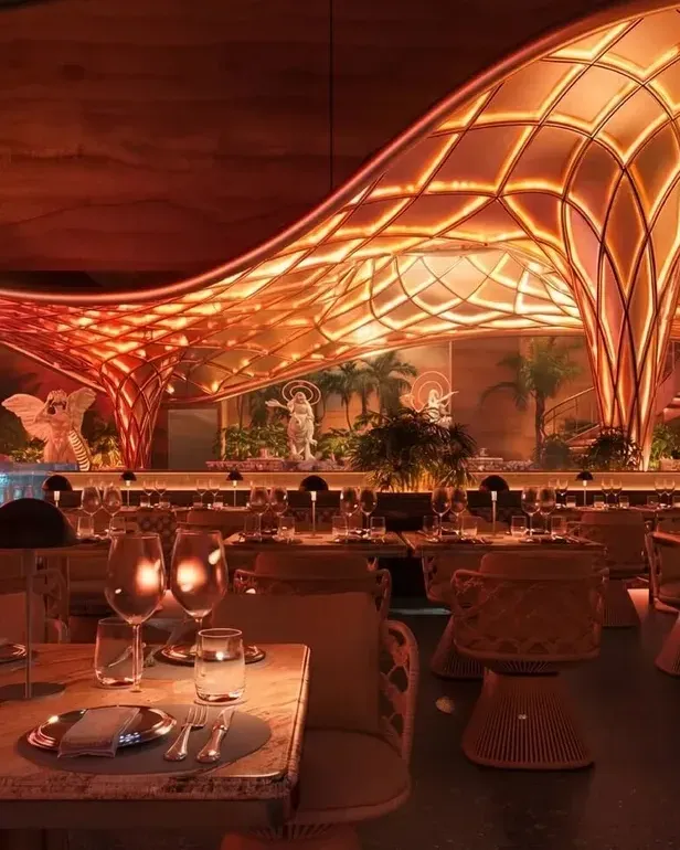 Palmora Saigon dining hall — lattice canopy and LED stage